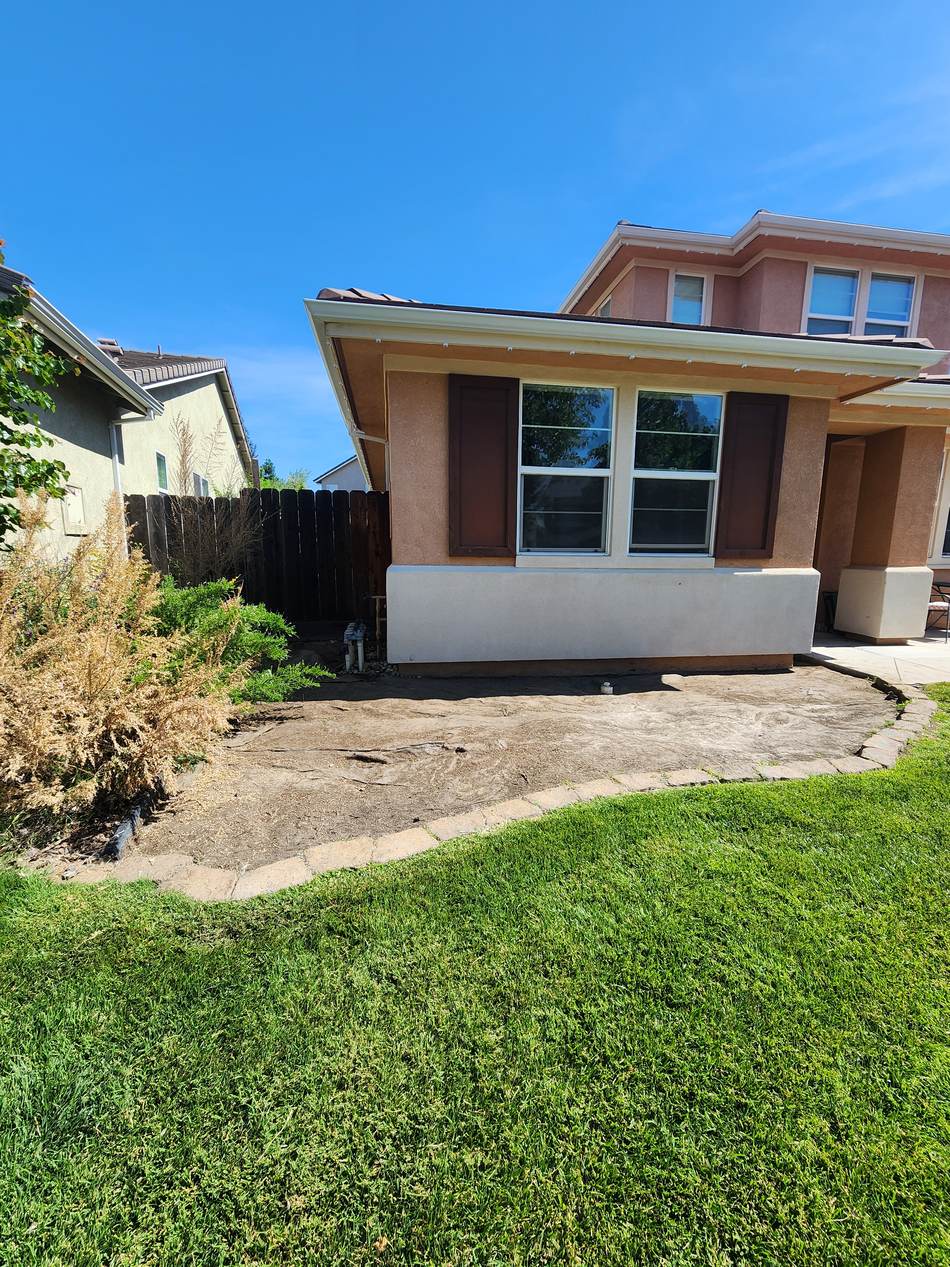 Yard area before concrete installation in Escalon