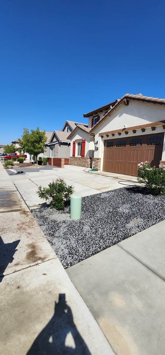 Finished front yard landscape transformation in Manteca
